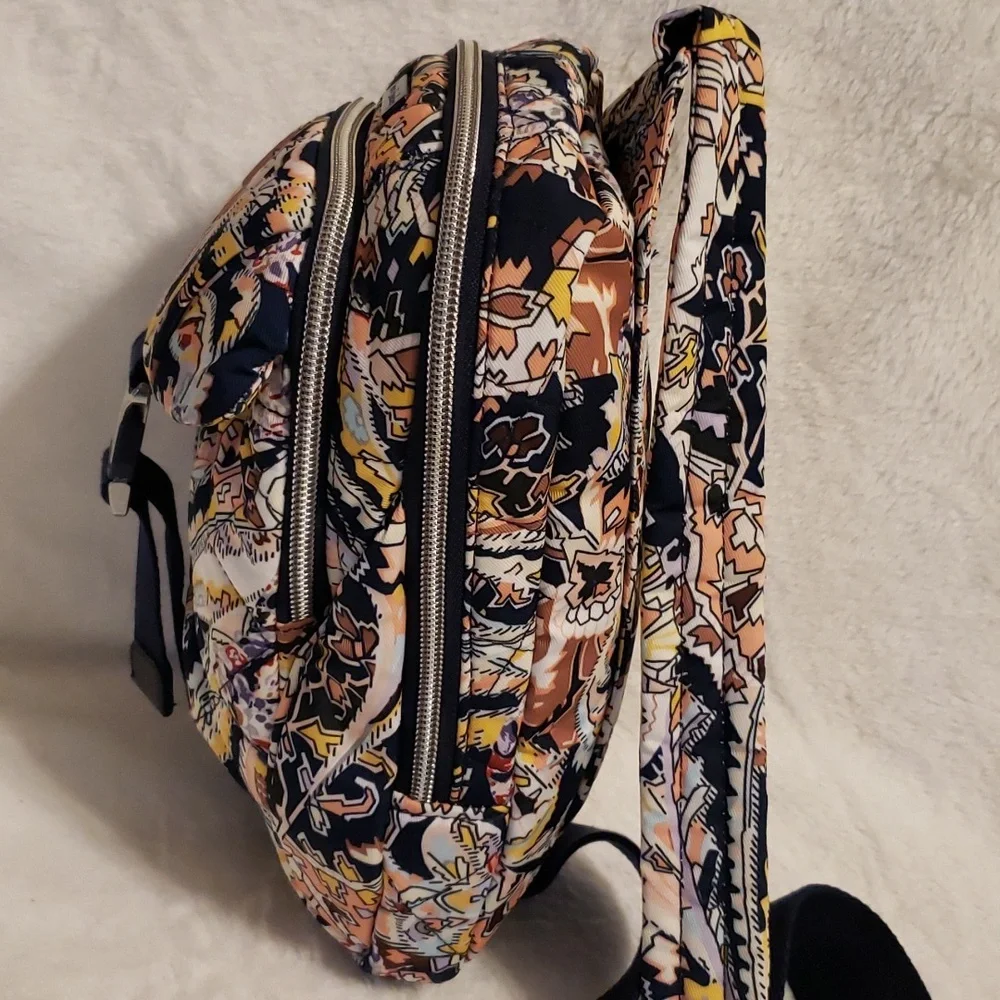 Vera Bradley Women's‎ Performance Twill Utility sling backpack.